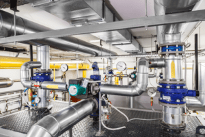 2 Industrial piping system with control valves and pressure gauges